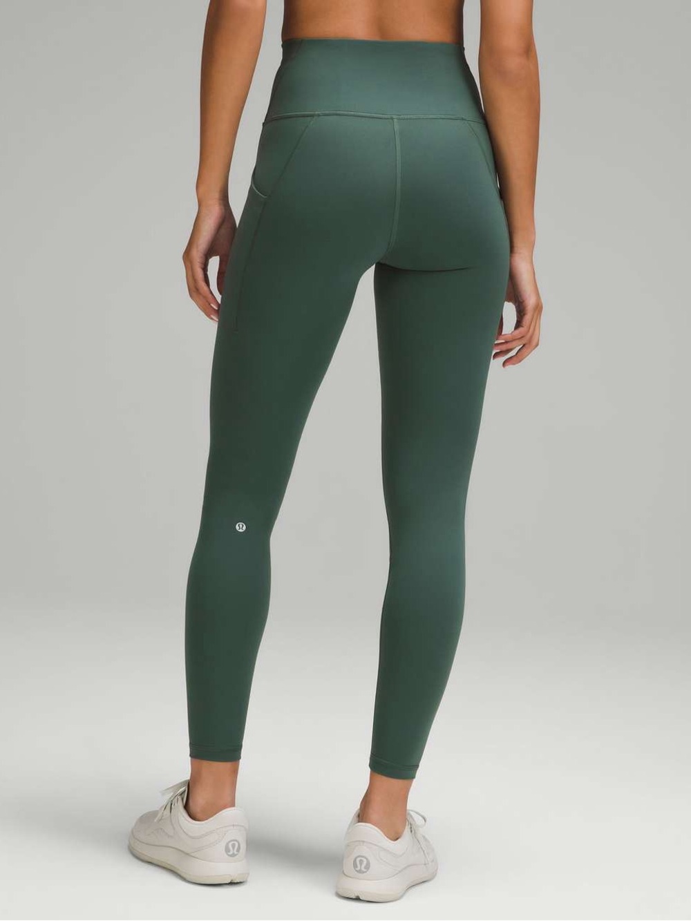 Lululemon Wunder Train High-Rise Tights in a green color